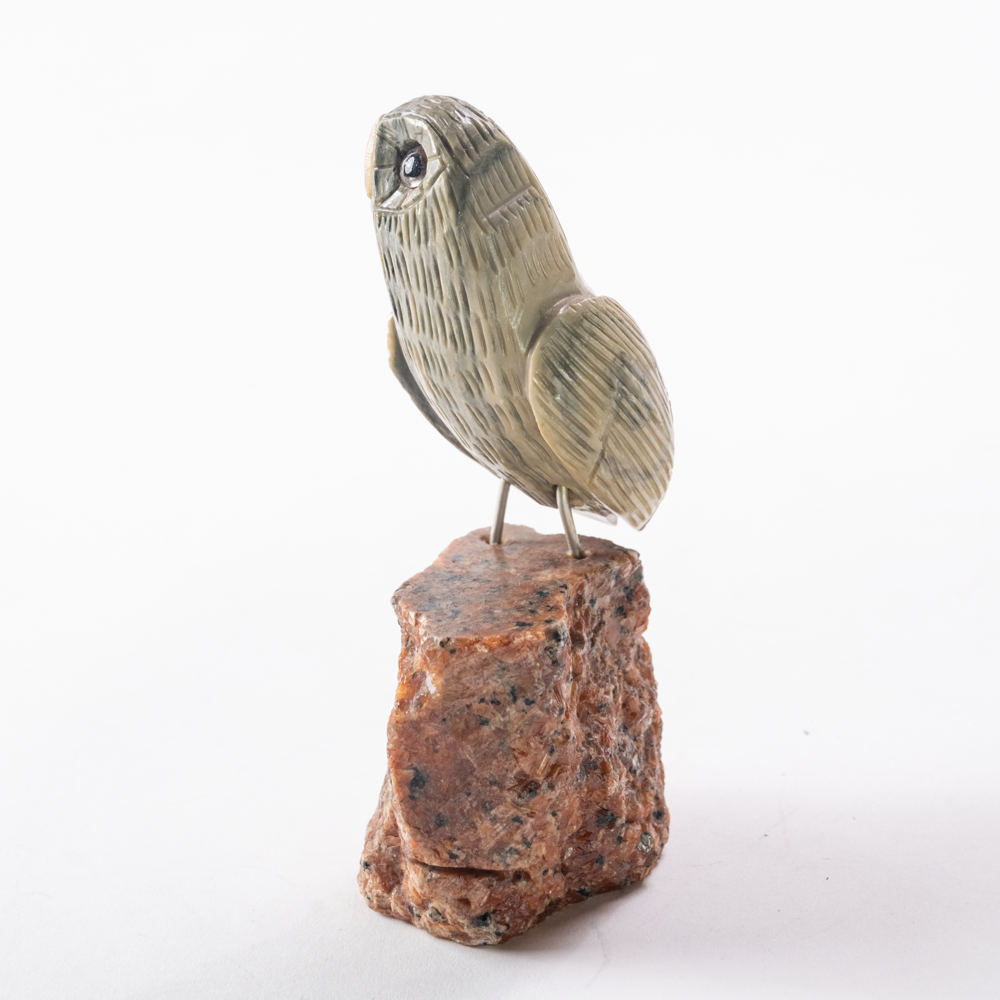 Carved parrot bird figure