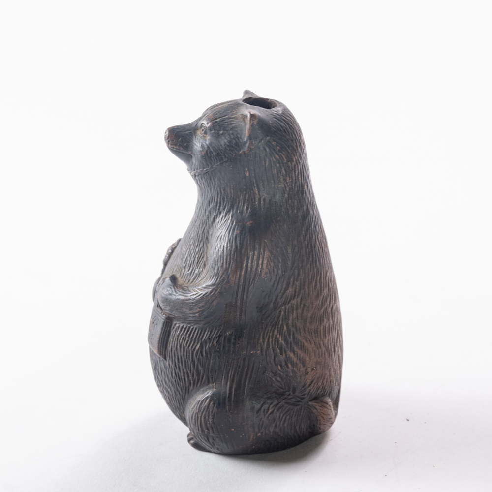 Raccoon dog vase